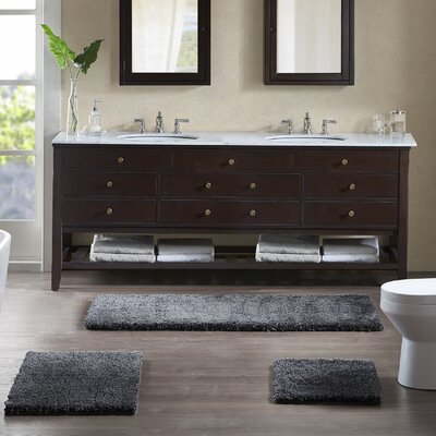 madison park grande solid tufted bath ru